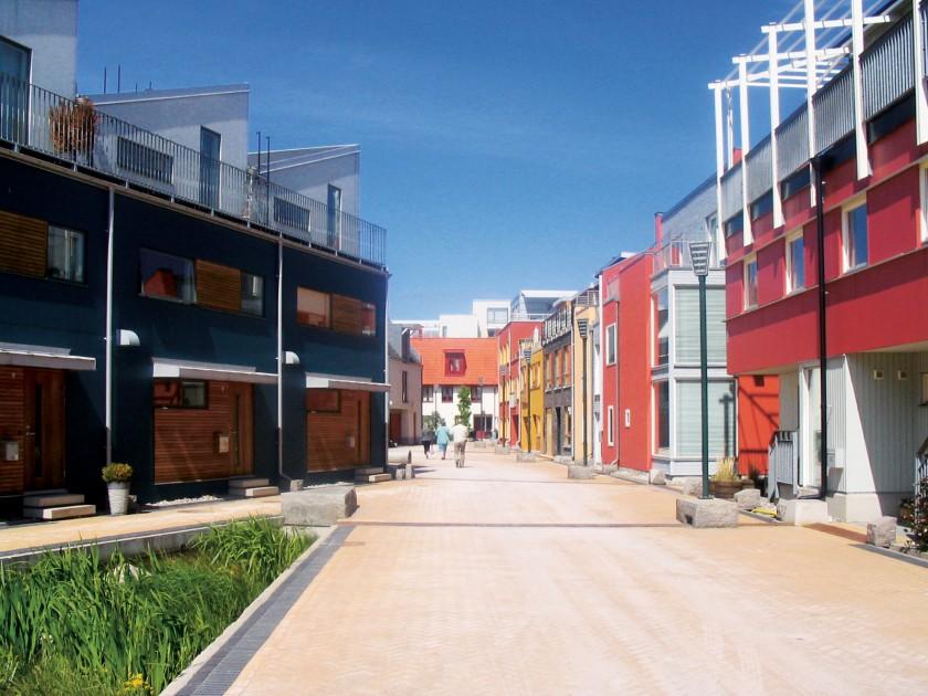Each building is surrounded by a gutter that is part of the design of the public space.