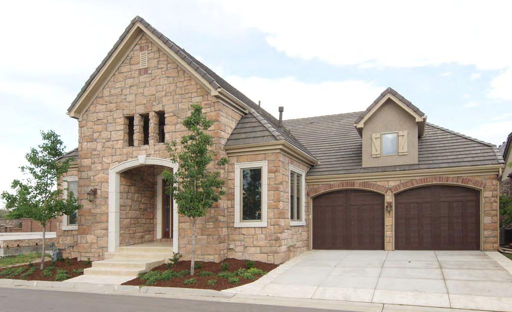 Exterior Appointments Architecturally rich masonry & stucco exterior Slate-style concrete tile roofing Carriage-style insulated garage doors Elegant entry door with transom Professionally planned,