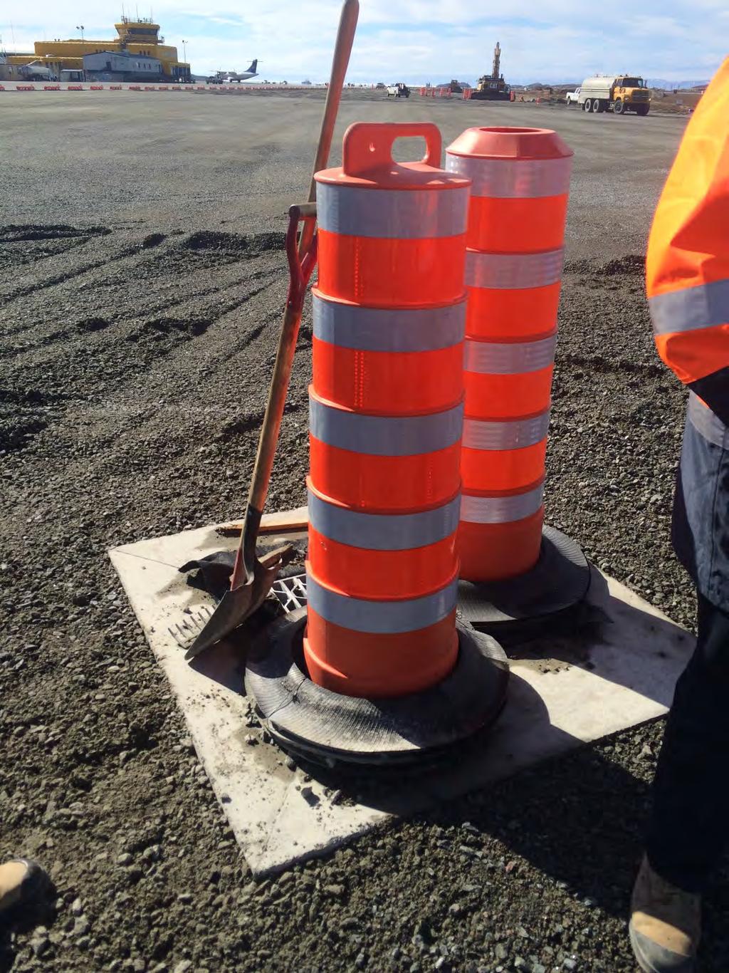 C. Road works including new and upgraded roads and bridge structures Stantec s design of the roadways for the new Iqaluit Airport is to an urban standard with subsurface drainage collection where