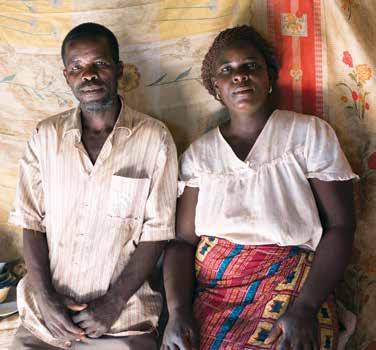 Zambia: Elizabeth and Simon Well before dawn, subsistence farmer Elizabeth Ngoma and her husband Simon Daka begin their day with a prayer of thanksgiving.