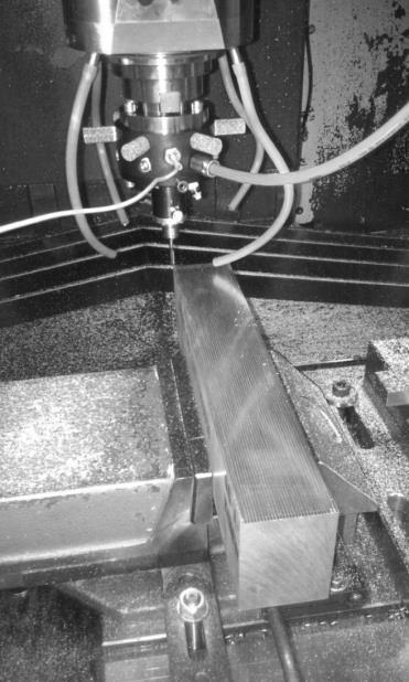 The high-speed pneumatic spindle was clamped in the machine-tool s main spindle. The main spindle was held stopped by its electromagnetic brake.