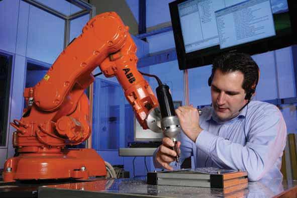 When an industrial robot is being used as a third hand for a worker, use of a redundant robot will further increase the flexibility of the system.