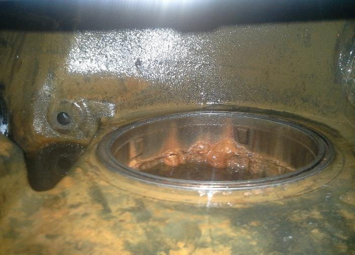 Evidence of Trapped Air Under Riser Check Valve The pictures below show two aspects of oxygen corrosion in the riser assembly.