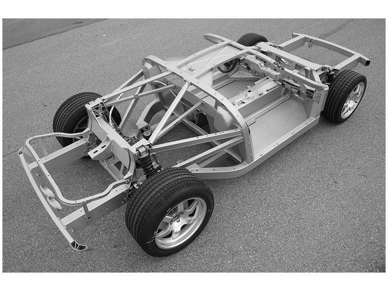 Weight Savings Designs Figure 7-3a) (Left) The space frame chassis for the 2005 Ford GT is comprised of 35 aluminum