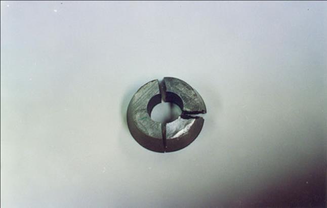 with especial care in the radial direction first to separate the bore of the flange from main body of the flange; see Fig. 3 for the radial cut of the bore of the flange.