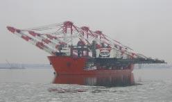 HEAVY LIFT Heavy lift shipping hangs on Fully (or near fully) erect transport remains the preferred method of shipping ship-to-shore container cranes, but demand for new cranes slipped last year.