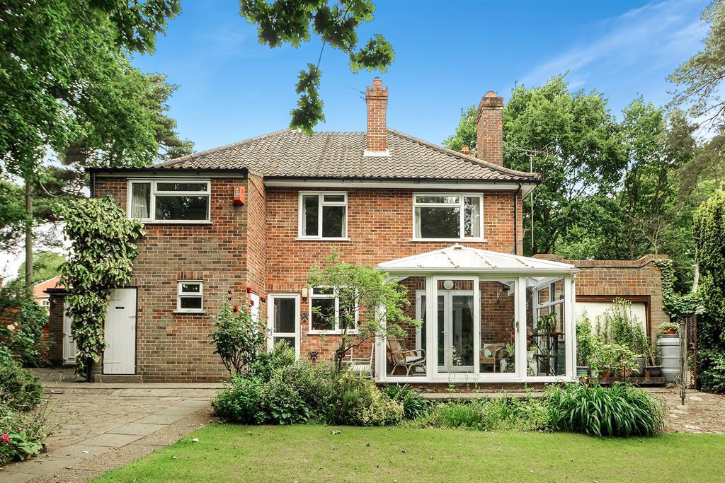 APPROACH The property is approached via a mature hedgerow frontage, sweeping shingled driveway with parking for numerous vehicles, leading to the garage, and gated access to the rear garden, lawned