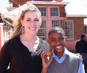 Handing out apples An apple a day keeps the doctor away. HORTGRO supports fundraiser HORTGRO s new Events Coordinator, Thea Visser, with a smiling pupil from Dryden Primary School.