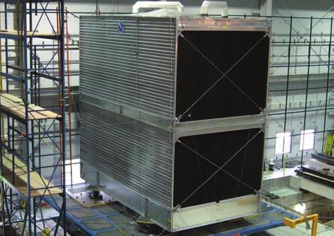 2. Testing A full-scale cooling tower is subjected to a simulated seismic event in a test laboratory.