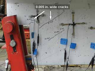 7 Preexisting cracks before loading In some of the test specimens, inclined hairline cracks were observed on web faces before testing.