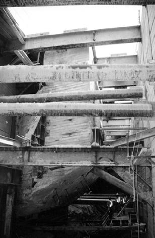 Two existing vent structures were also supported by Anchor Shoring as shown below. Figure 7: Support of S/East Wye vent shaft using Dywidag Hangers hung from deck beams.