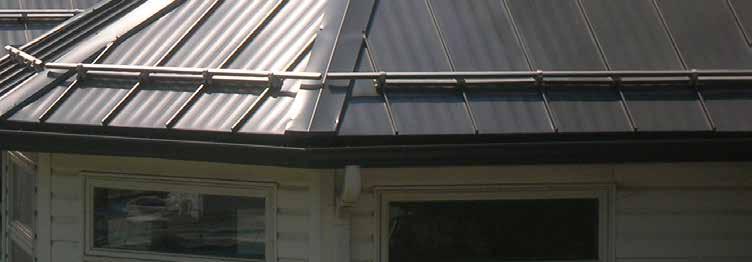 Standing seam in Charcoal Gray covers the roof of this home.