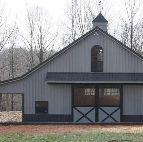 The panels have clean traditional lines, and are manufactured from the best structural steel available. Grandrib 3 in Antique Bronze and Hickory Moss is shown here with a cupola.