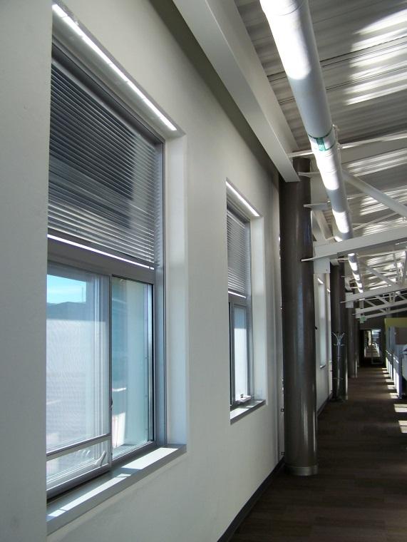 The daylighting windows are equipped with interior light louvers.