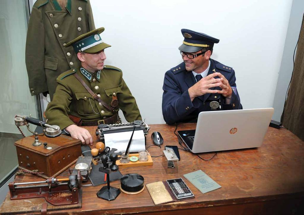 Czech Republic Times have changed A Czech Customs officer today, sitting next to a member of the former Financial Guard as they looked 100 years ago.