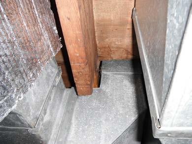 The wood roof steps should have a graspable rail on it and these are some uneven treads which should be repaired all steps should be evenly spaced.