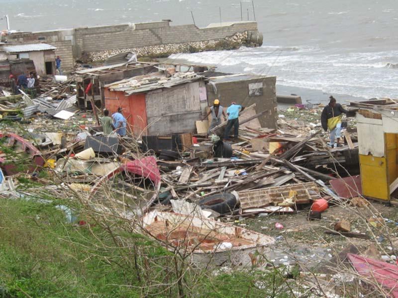 The poor are most vulnerable to extreme climate and weather events. Picture above shows damage to shelter and fishing boats in a poor fishing community in Jamaica from Hurricane Dean in 2007.