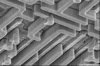 SEM Micrographs of Polysilicon, Tungsten LI and Tungsten Plugs Tungsten LI Polysilicon