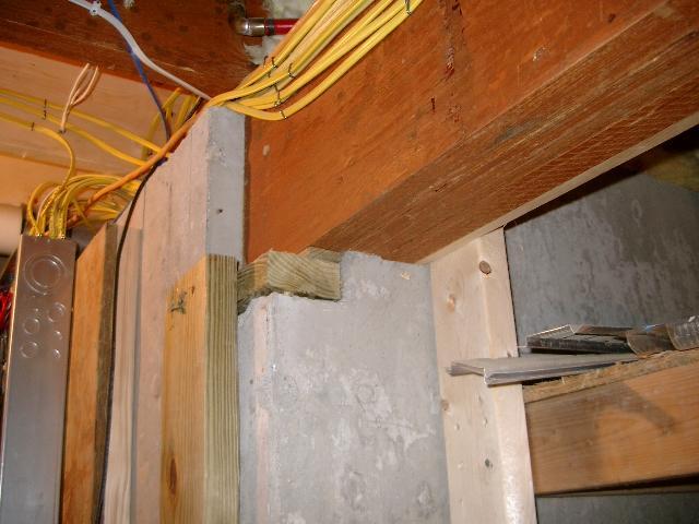 6. Structural Defects This support beam was misaligned where it meets the foundation.