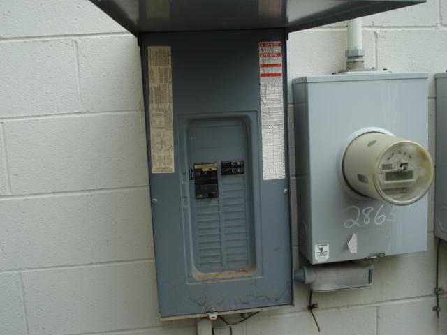 amp 208v/120v 3 phase 4 wire house panel is located at the rear of the building.