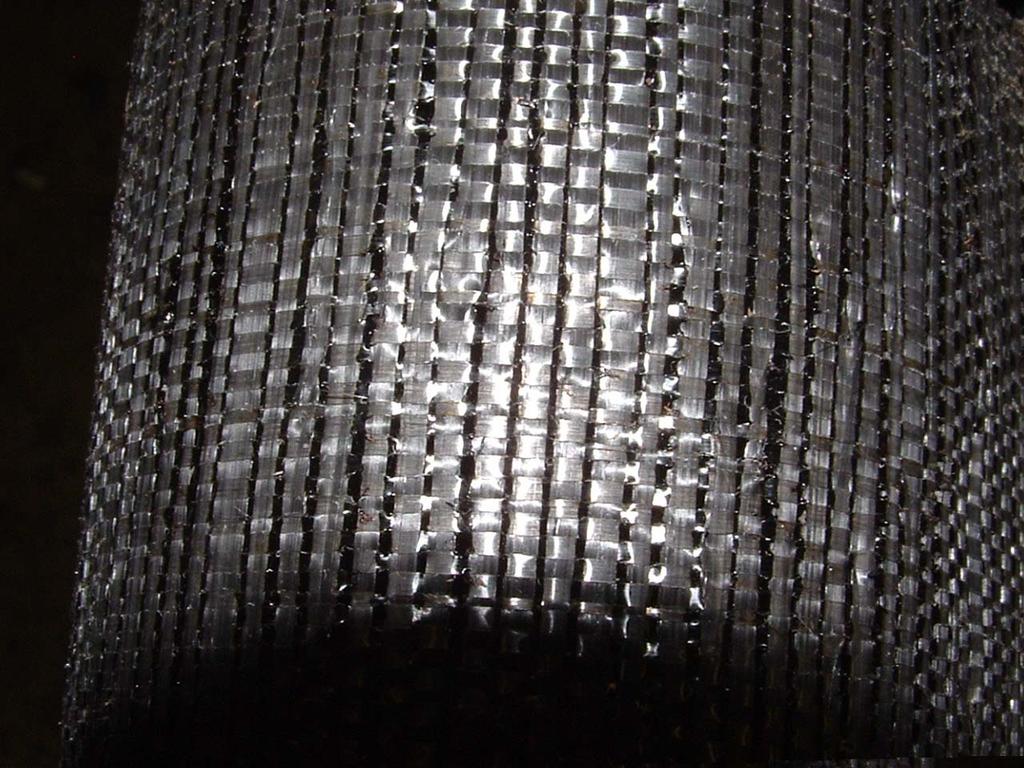 Compound extruding through the weaves of the