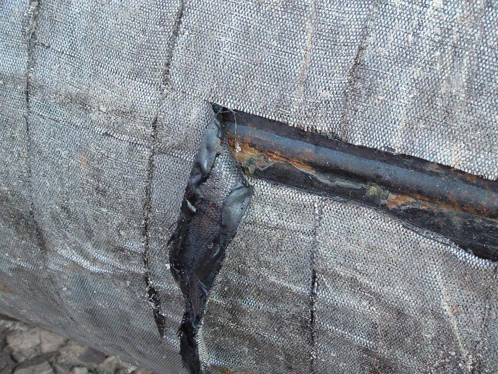 The compound was displaced at weld seam because it was not stripped leaving little or no compound.
