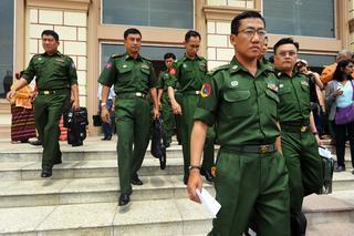 3 Tatmadaw officers (Myanmar Army) leave Parliament in Naypyitaw, Myanmar, on March 30.