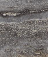 Efflorescence in natural stone is caused by water carrying mineral salts from below the surface of the stone rising to the exposed face.