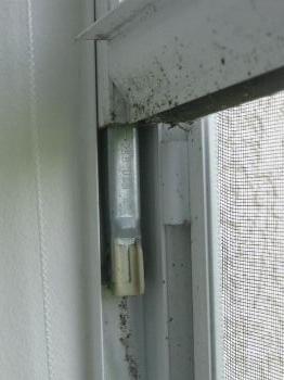 Broken sash wire/cord observed on window frame. This is a "Safety Concern".