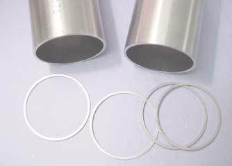 Fig. 8: AL-6XN tube samples with end preparation suitable for orbital welding. C-22 insert rings are tack welded in place prior to welding in an enclosed orbital weld head.