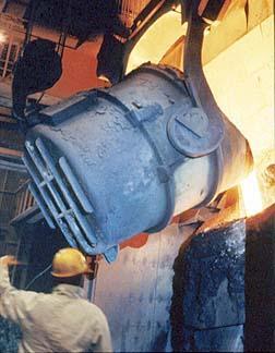 Basic Oxygen Furnace Steel Barrel lined with refractory material. Barrel pivots on a shaft and tips to one side so the molten scrap material molten iron from the blast furnace can be poured into it.