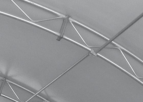 13 Figure 18. Hoop frame connection to post frame wall. Note curtain sidewall. Figure 19. Hoop frame connection to concrete foundation. Hoop truss frame has a 120-foot clear span.