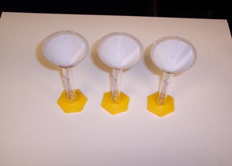 Funnels lined with filter paper.