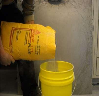 Mixing Add B (powder) Component to pail with