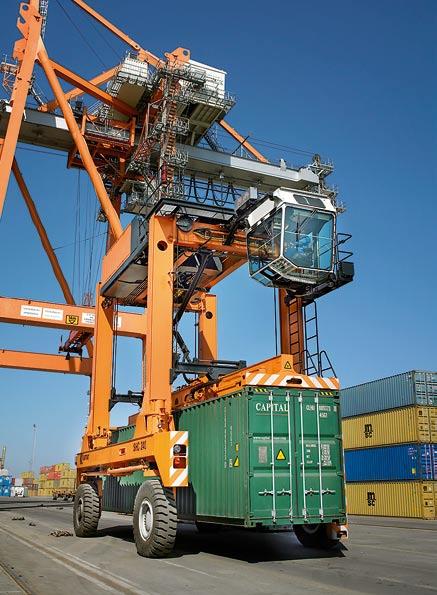 Vessel Side Operation Shuttle Carriers leave and pick up containers directly from the ground under the ship-to shore crane, thus creating a buffer under the crane.