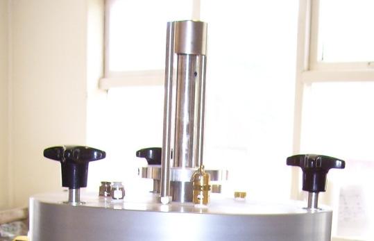 of air pressure. The sample is mounted in the pressure cell(fig6). The cell is then sealed on to the base.