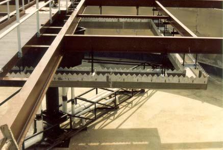 center-feed s concrete peripheral effluent trough is a costly addition to tank construction.