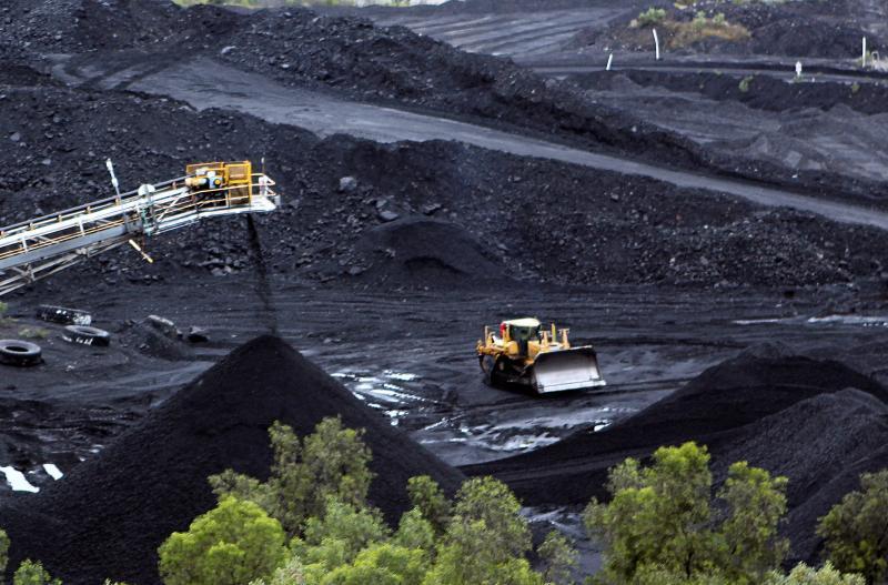 Reuters Coal is stockpiled at the Blair Athol mine in the Bowen Basin coalfield near the town of Moranbah, Australia, June 1, 2012.