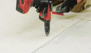 22 4 Board installation a) Apply a complete bed of flexible tile adhesive to the subfloor.