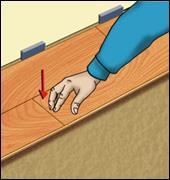 Continue in this manner until the first row is complete. Use the remainder of the last plank of the first row to start the second row, provided that it is a minimum of 16 in (40 cm) long.