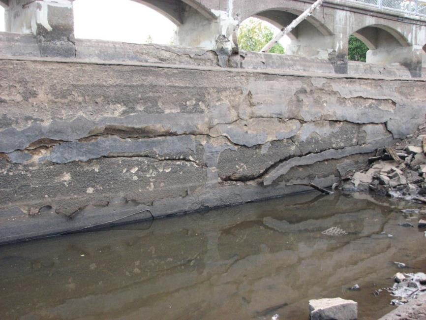 Problem Assessment Protective concrete at exterior of dam infrastructure is deteriorating and needs rehabilitation Severe spalling and delamination of the east retaining wall Severe cracking and