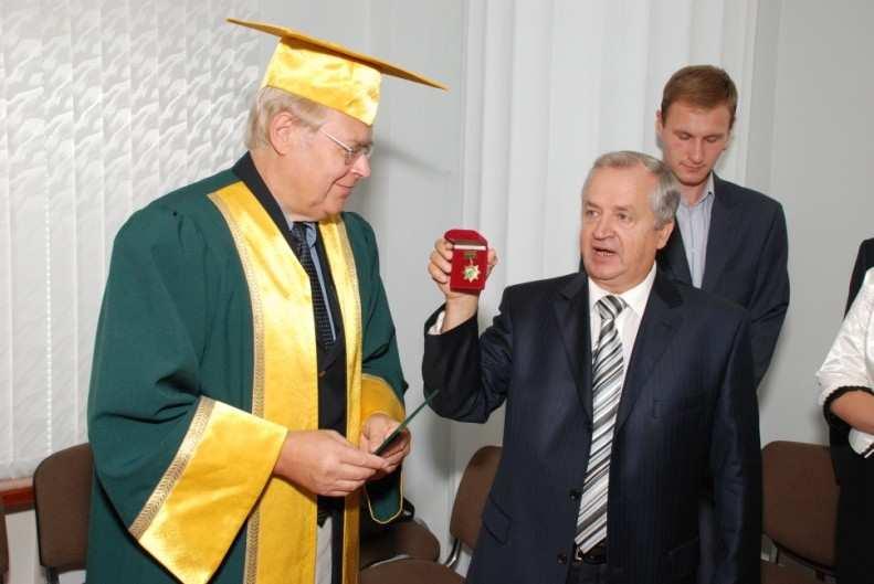 A medal "For Service to the Academy" 2-nd degree awarded Professor