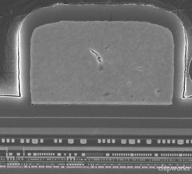 Intel Xeon E3-130V2 General Structure A closer TEM image (Fig. 4) shows the lower metal stack and a pair of multi-fin NMOS and PMOS transistors.