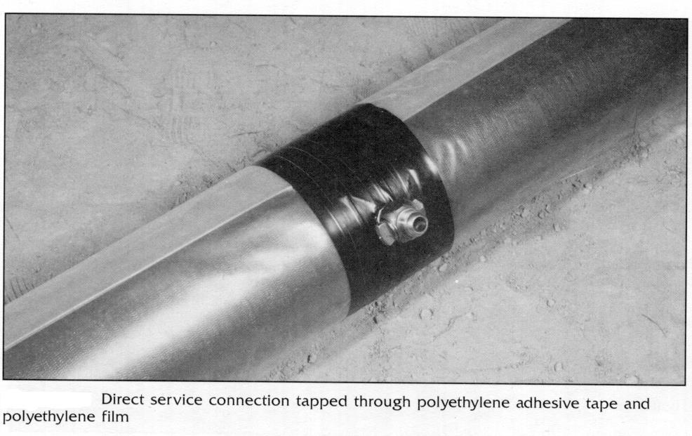 c. Polyethylene Wrap When direct tapping on pipe encased in polyethylene wrap, cover the area of the pipe to be tapped with dielectric tape to protect the polyethylene wrap from additional damage.