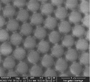 6) A Scanning Electron Microscope (SEM) image of polystyrene bead in hexagonal formation The spherical inclusion shape is the most promising of them to work with.