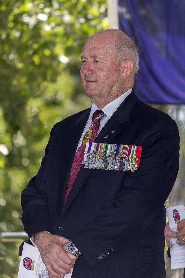 His Excellency The Honorable Sir Peter