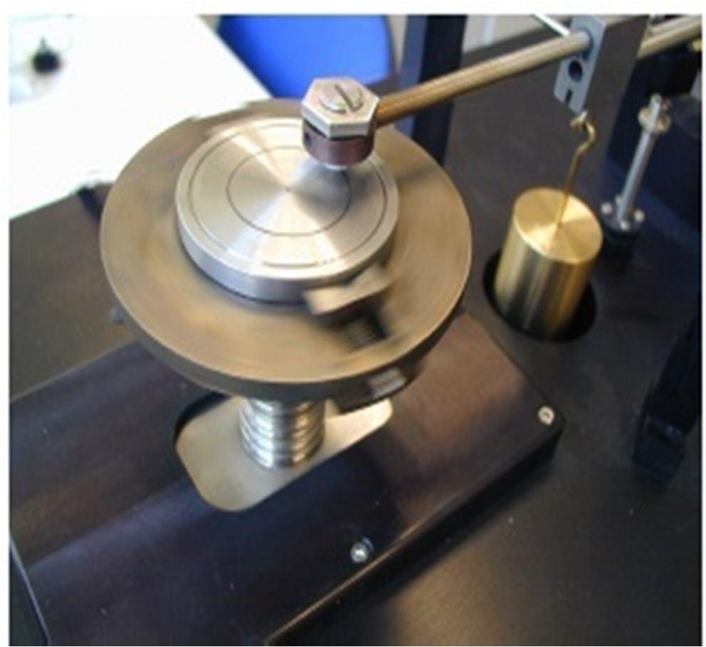 Wear testing was done using a testing pin-on-disc test rig as shown in Figure. Wear results are reported as volume loss in cubic millimeters for the pin and disk separately.