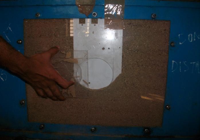 After filling the sand in the tank, top surface was leveled using sprit level. Then the strip load is placed on the tank as per required test condition.