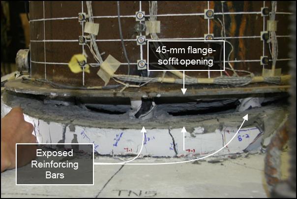 As the North side of the specimen was subjected to tensile loading during the 16 th load set, the opening between the soffit and the annular ring increased to approximately 45- mm.