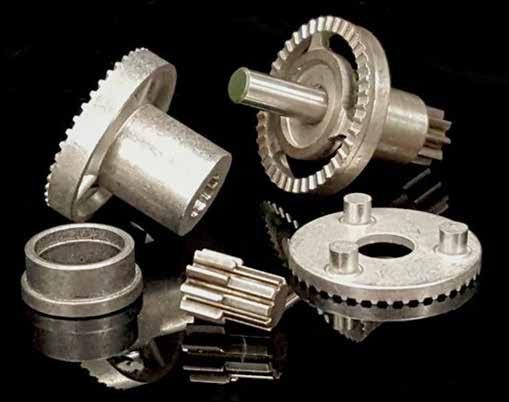 PM Tool and Part Design: Fig. 1 Clutch rotor assembly consisting of four parts an armature, rotor blank, bearing and pinion gear.